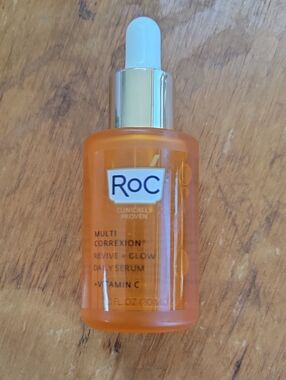 tarte orange and gold dropper serum bottle